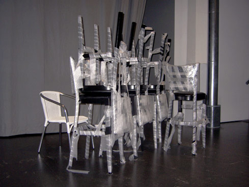To Do Nothing, 2007/08 Chair, aluminium, plastic, 7 bar stools, wood, varnish, synthetic leather, foam foil, bubble wrap