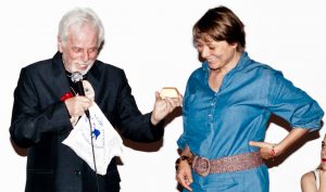 Jodorowsky hands Majewski the gold ingots. Photography: Oliver Helbig