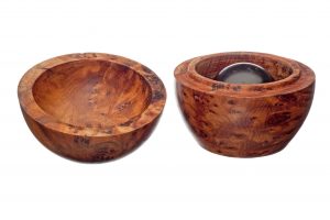 The Pot made from Fragrant Wood, contains one Black Ball or two Glass Eyes